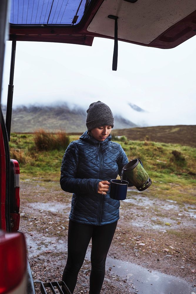 Woman pouring boiling water into a mug Premium Photo rawpixel