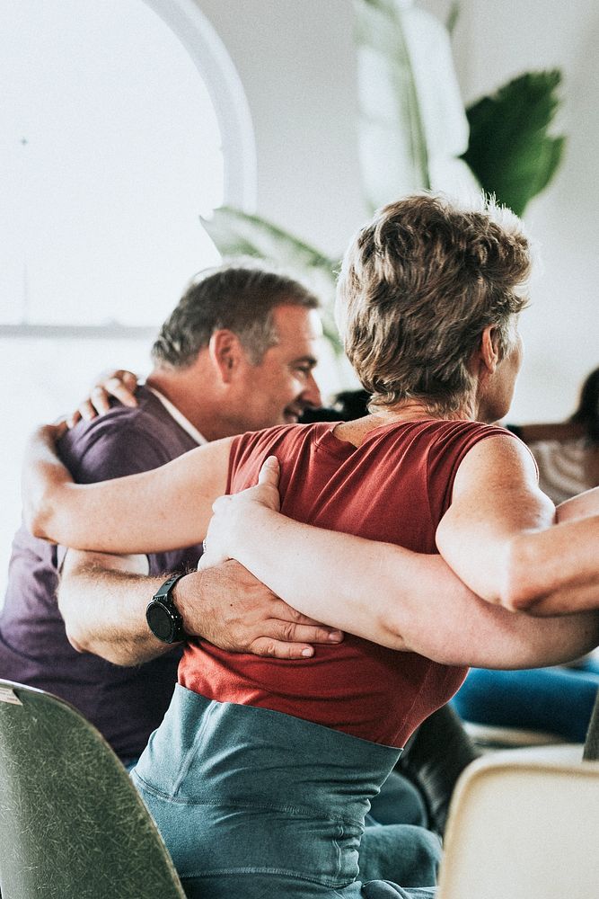 Diverse people in a supporting group session