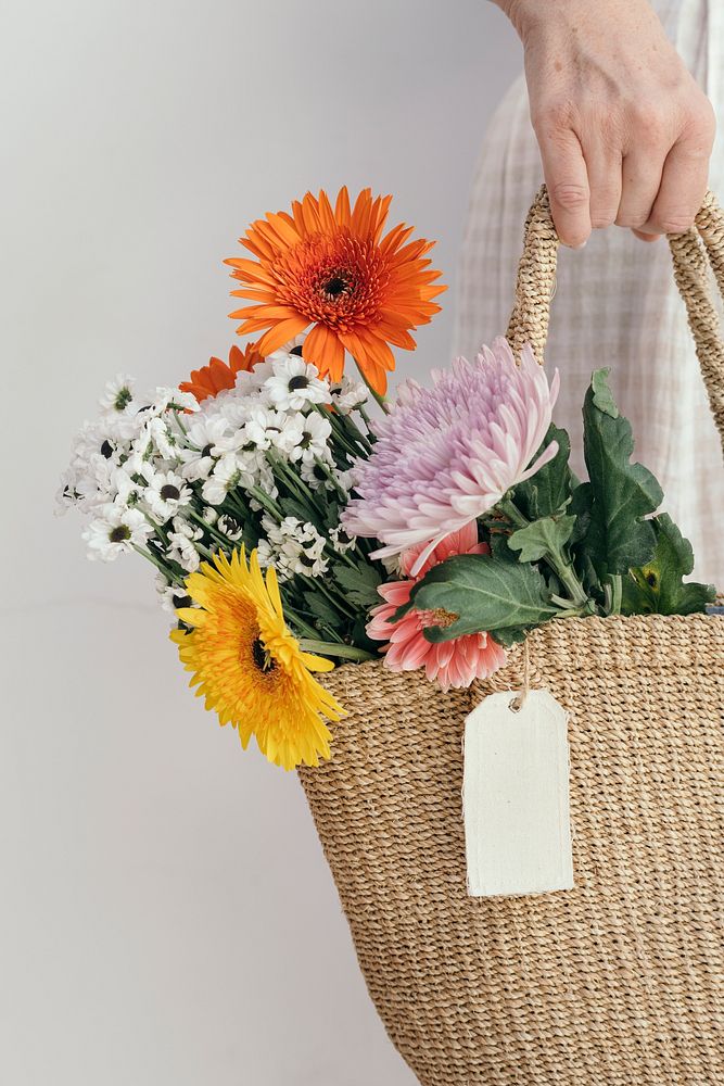 Girl carrying a bouquet in her bag