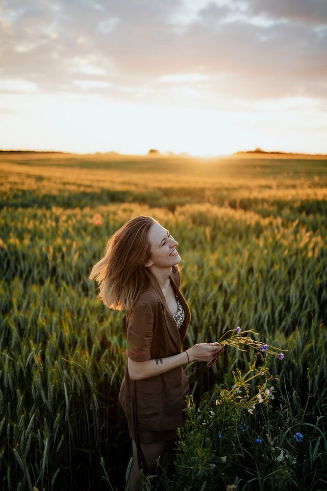 Cheerful woman in a field