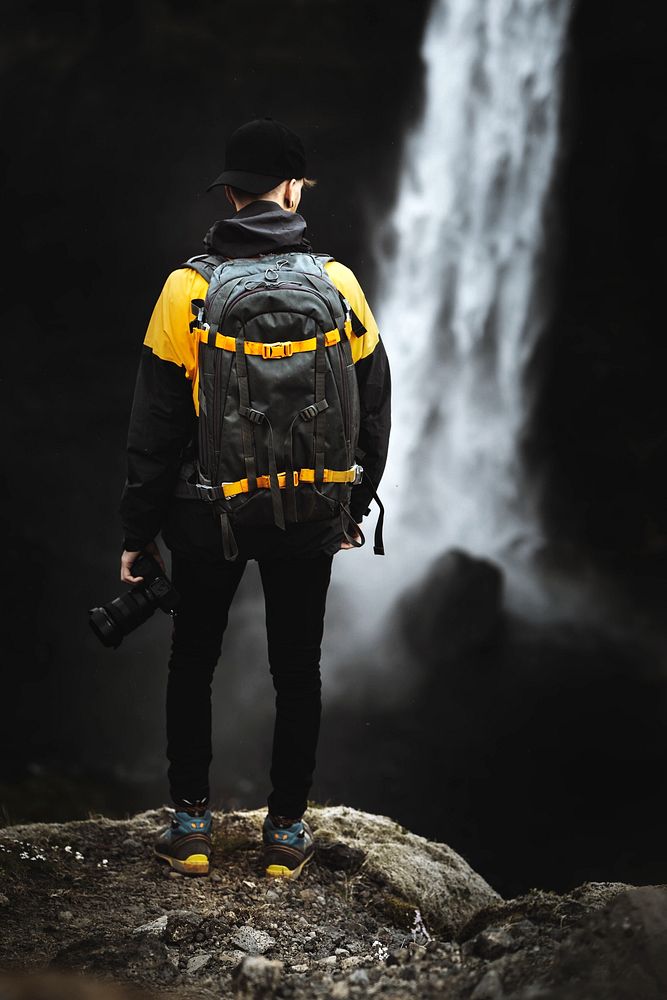 Photographer at the Haifoss waterfall, Iceland