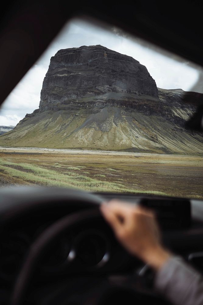 Man driving on a dirt road in Iceland