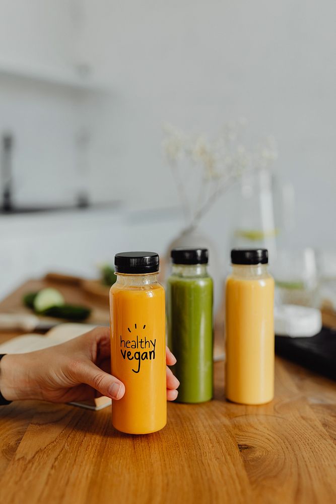 Homemade freshly squeezed juice in bottles mockup