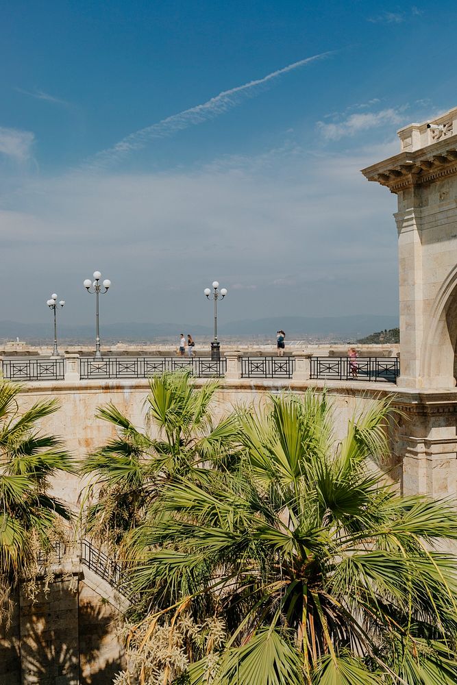 People on a bridge overlooking the city of Cagliari, Sardinia, Italy