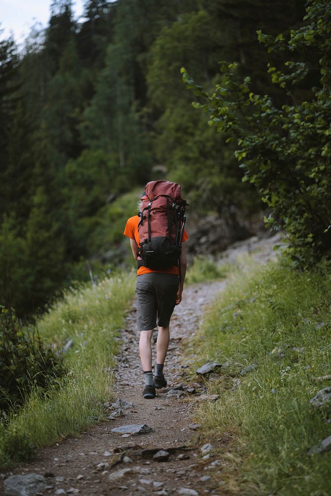 Backpacker hiking in Chamonix Valley