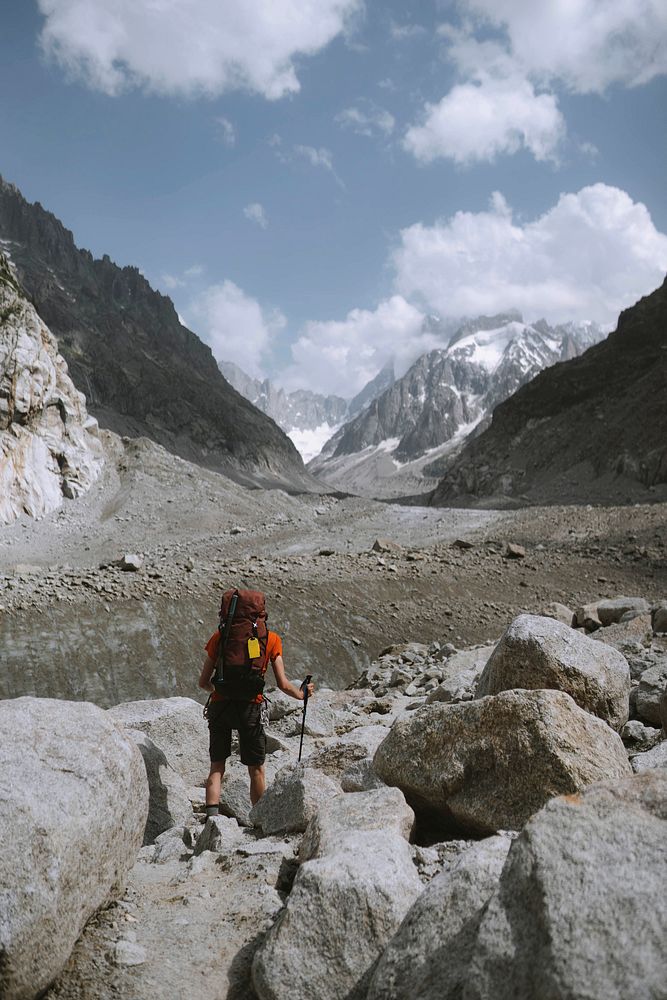 Hiker walking up Chamonix Alps in France