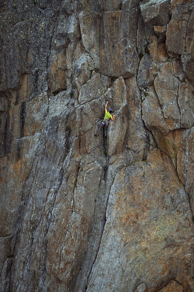 Rock climber working his way up the Aiguille Rouge