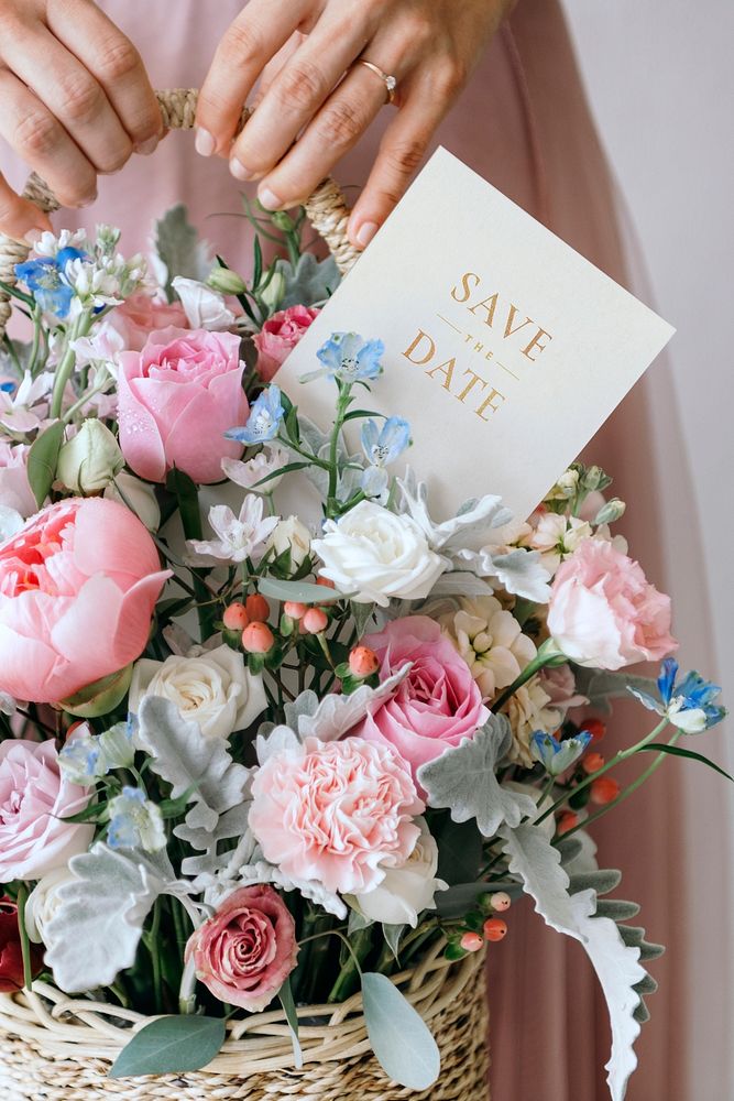 Woman holding a basket of flowers with a white card mockup