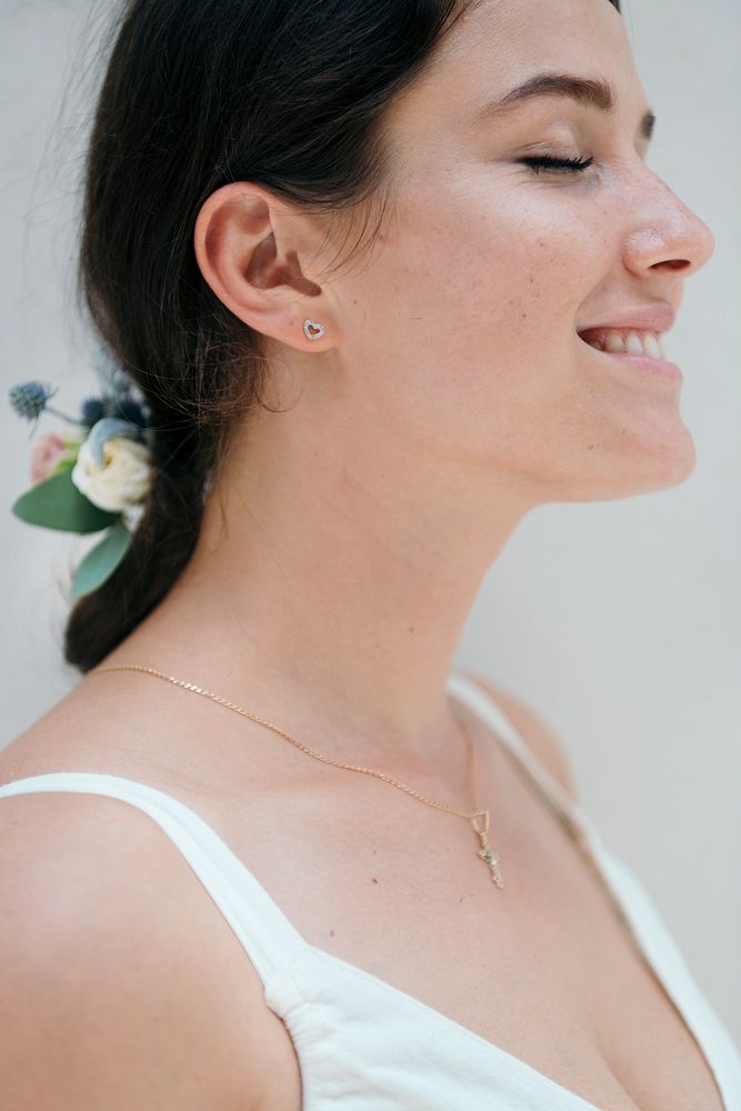 Profile portrait  of a woman wearing flowers in her hair