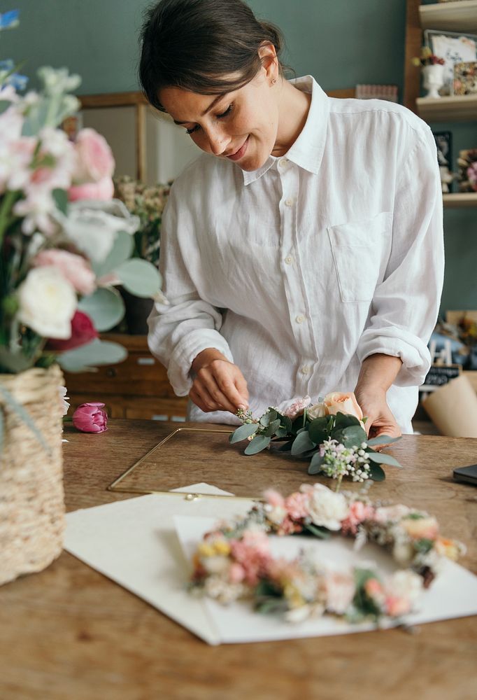 Florist arranging a bouquet of flower