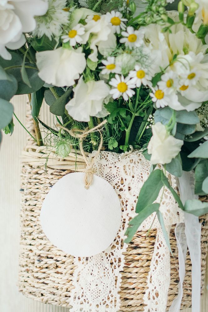 Wooden basket of white flowers