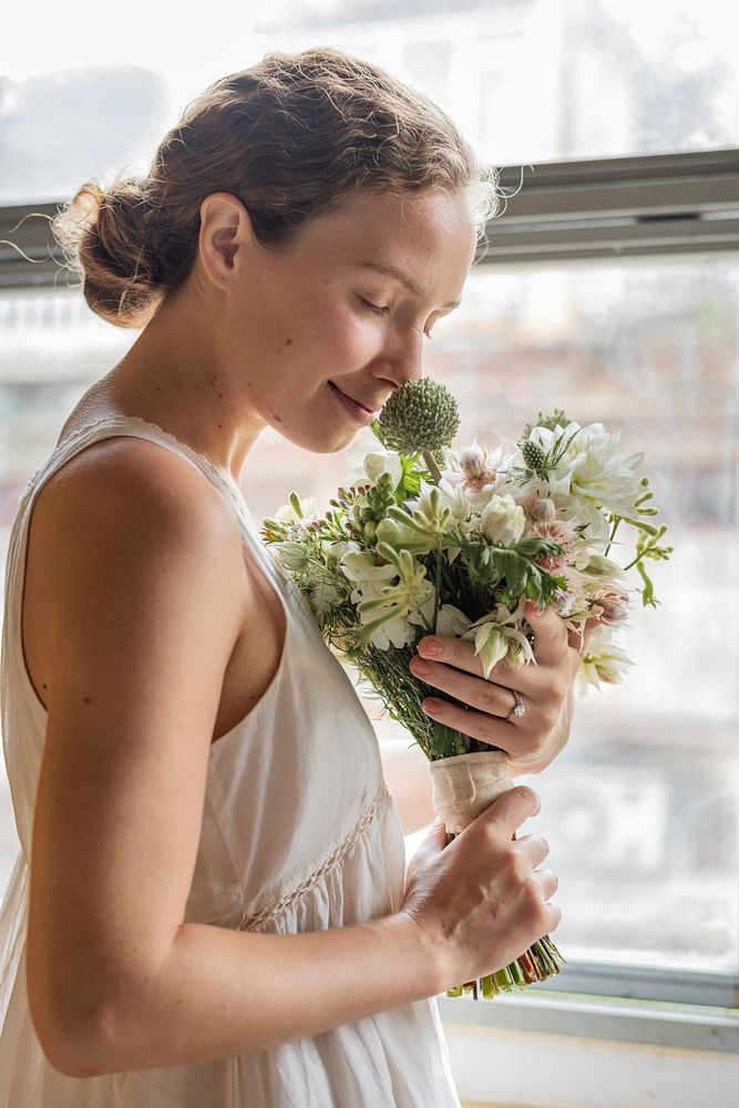 Caucasian bride holding a bouquet