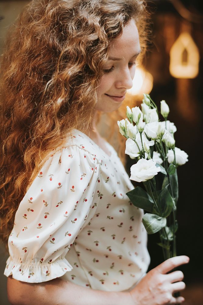 Woman with white roses