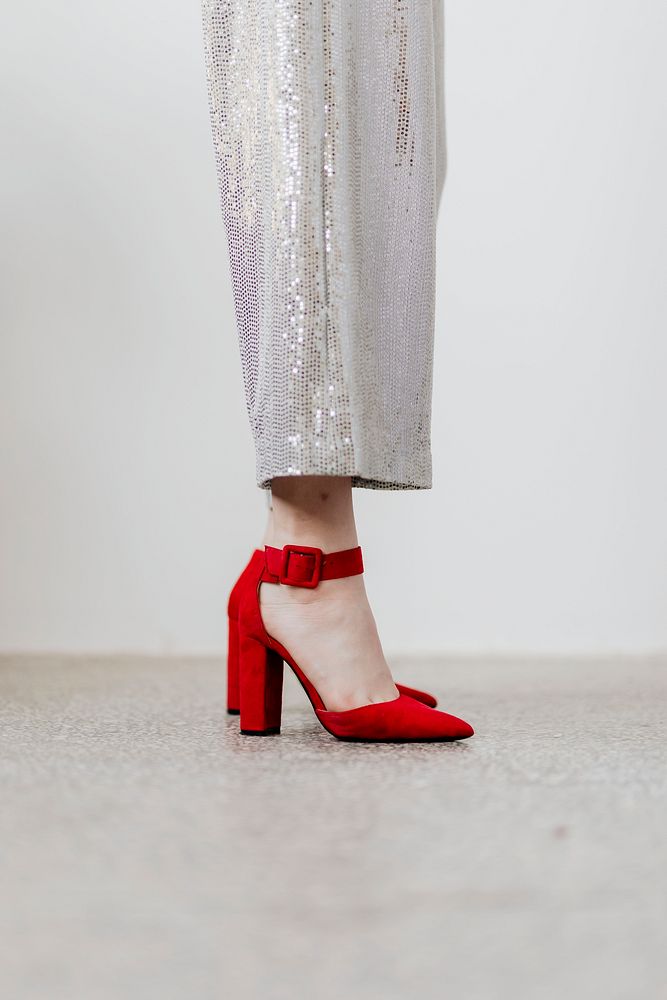 Fashionable woman in red heels