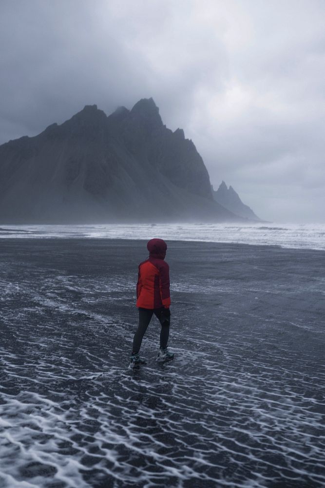 Woman at the southeastern Icelandic coast