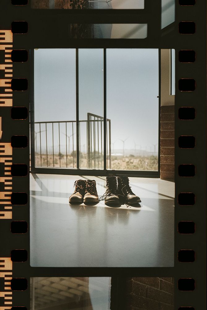Film strip with a photo of two pairs of shoes