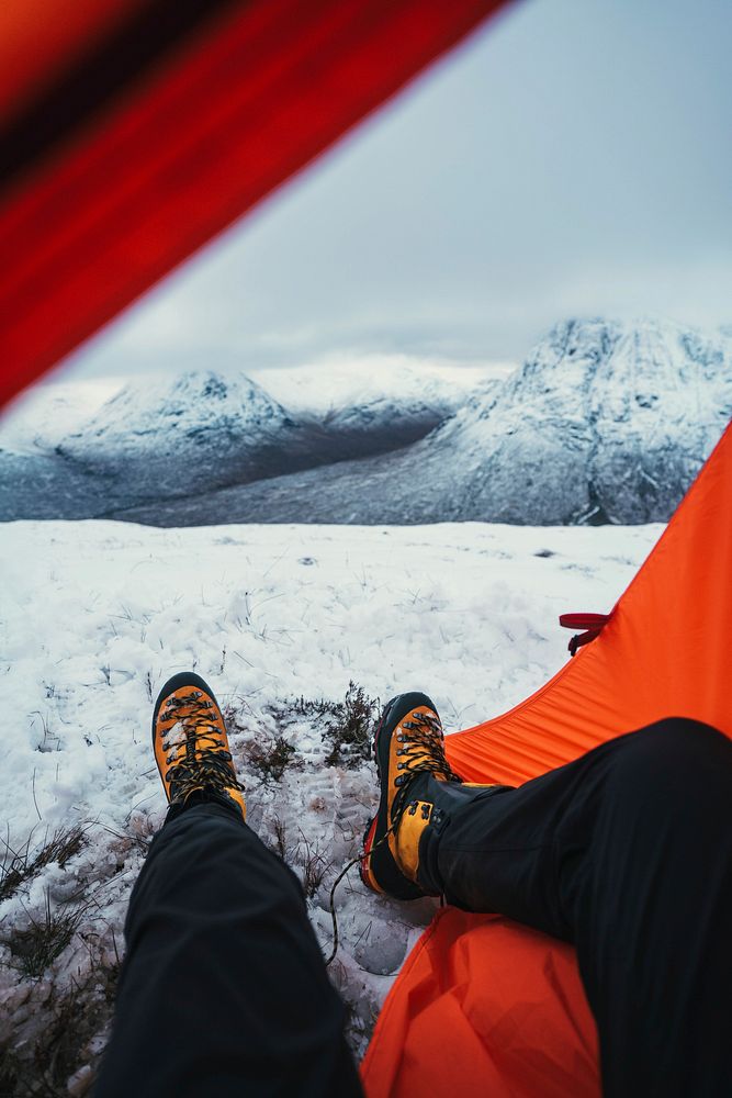 Snowy mountain view from a tent