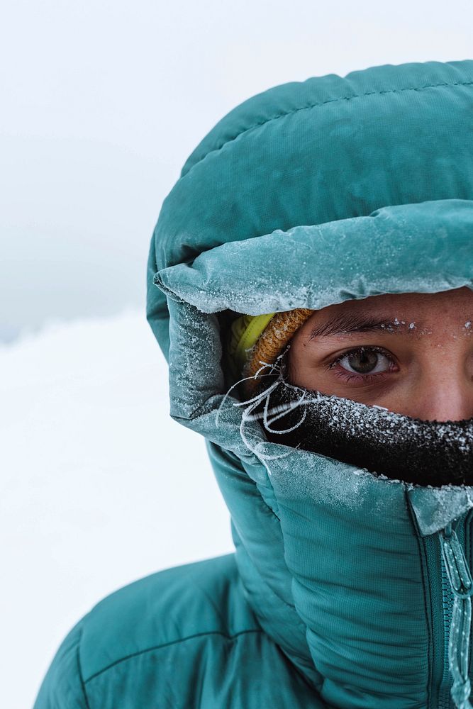 Closeup of a female mountaineer in wintertime at Glen Coe, Scotland