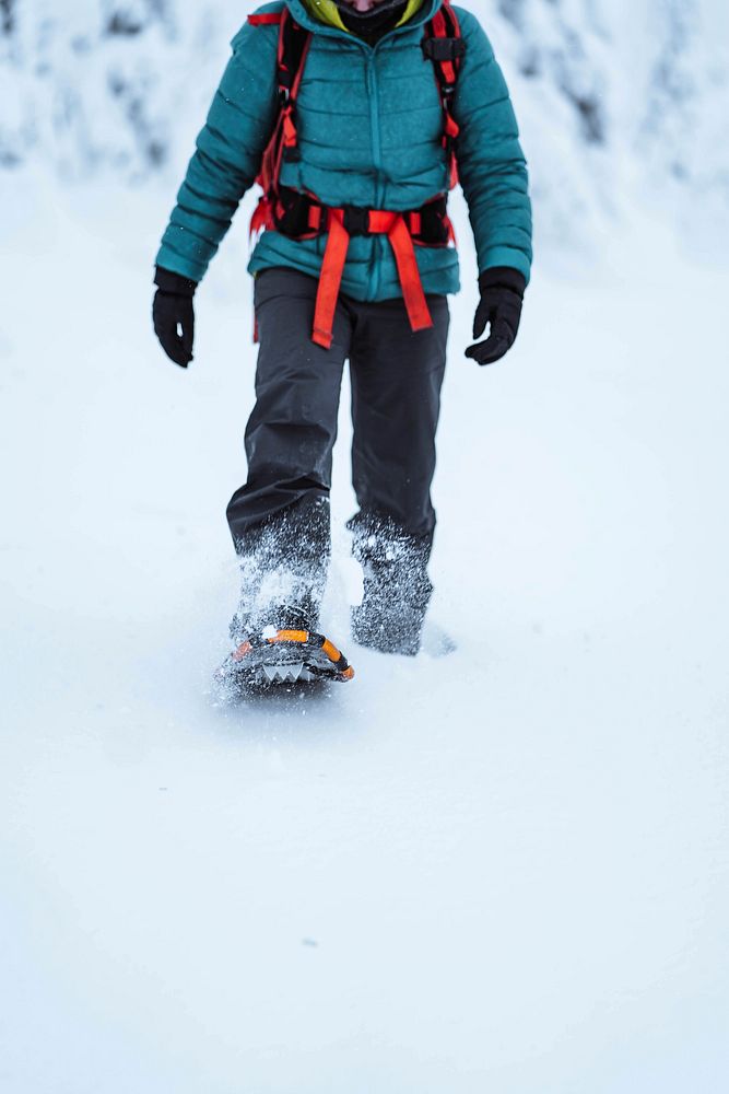 Woman trekking in her snow boots