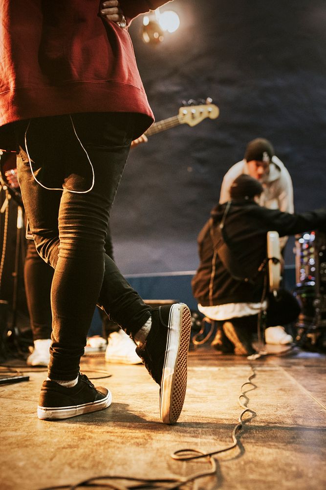 Man casually standing on the stage 