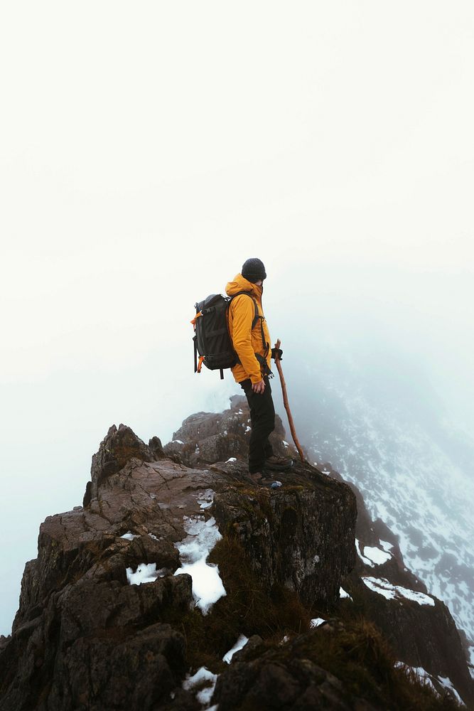 Hiker at Helvellyn summit in the English Lake District, England