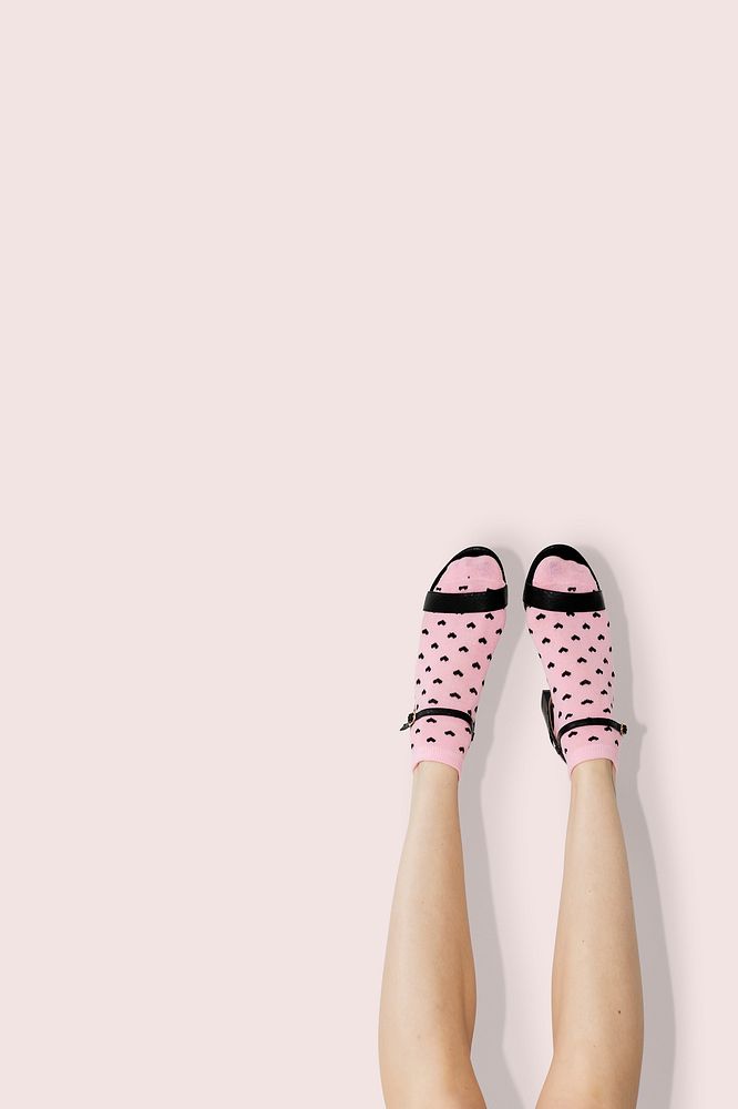 Woman in heels wearing pink socks