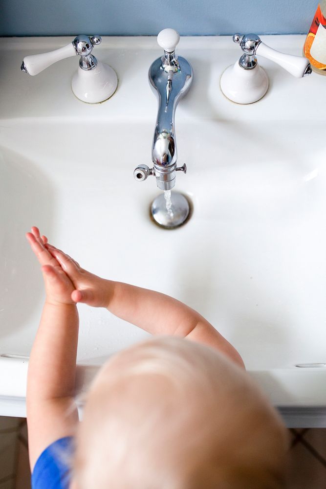 New normal lifestyle toddler washing her hands health photo