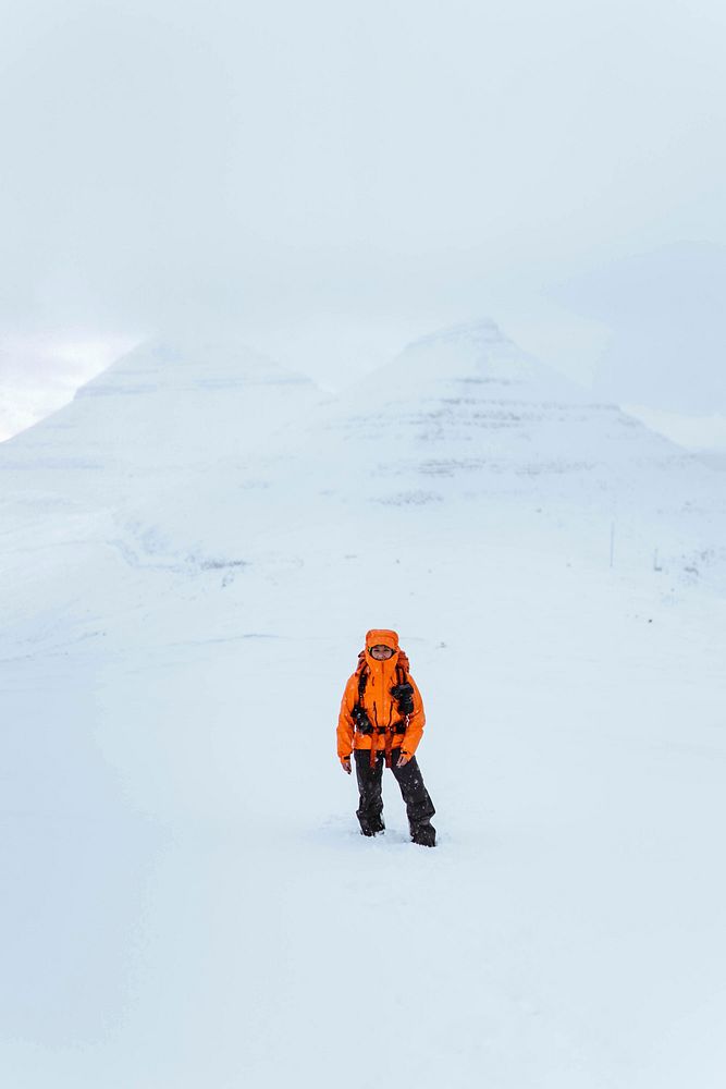 Landscape photographer at the snowy Faroe Islands
