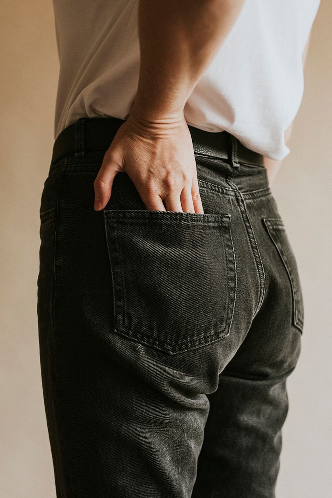 Woman in black jeans from behind