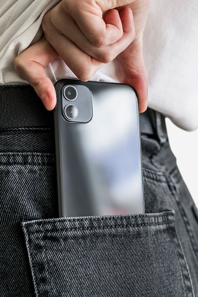 Psd mobile phone mockup in jeans back pocket
