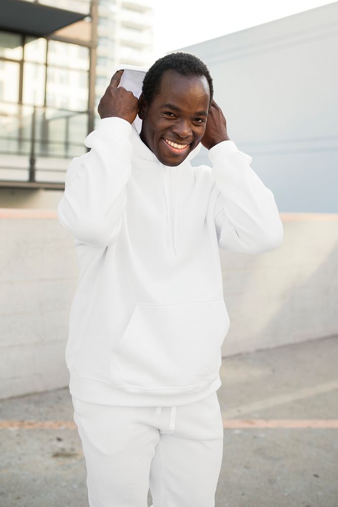 Cool man in white hoodie and sweatpants men&rsquo;s fashion apparel shoot