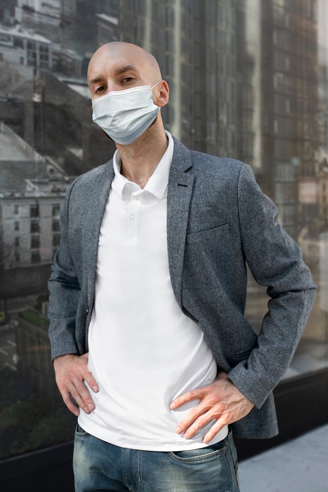 Businessman wearing mask living in the new normal lifestyle during COVID-19