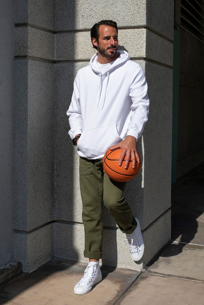 Sporty hoodie on a man with basketball