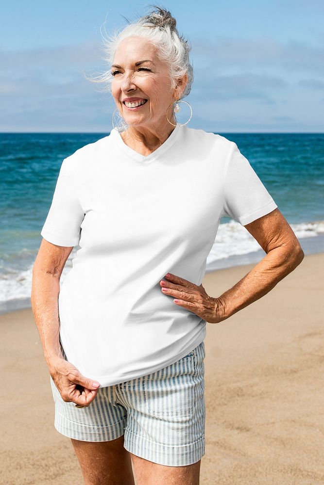 White t-shirt apparel psd mockup senior woman fashion shoot at the beach