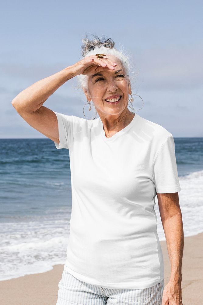 White t-shirt apparel psd mockup senior woman fashion shoot at the beach