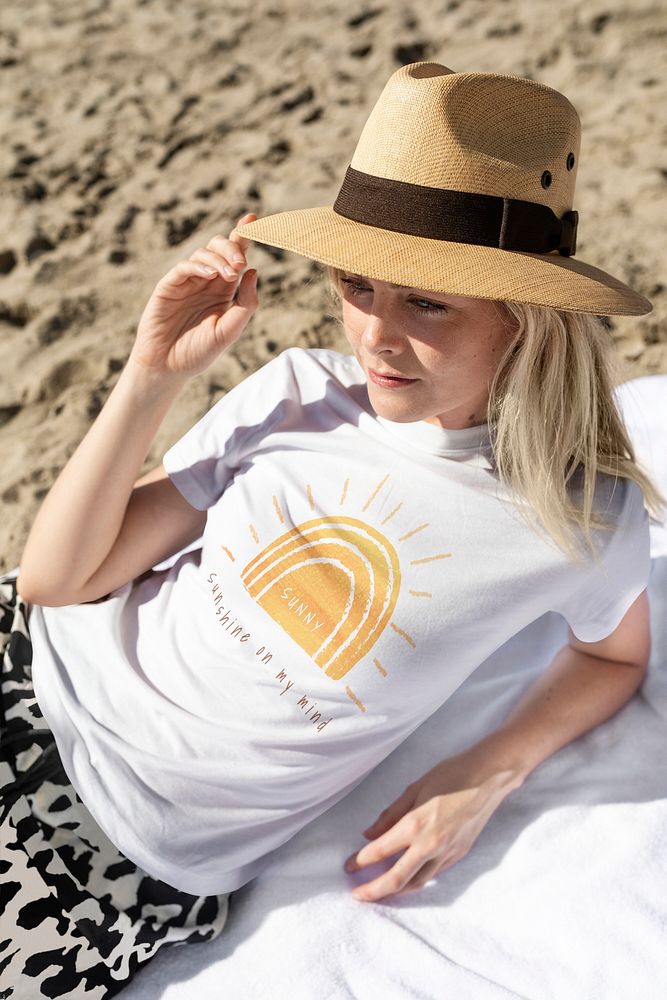 Cream t-shirt mockup psd with sunset print beach apparel shoot