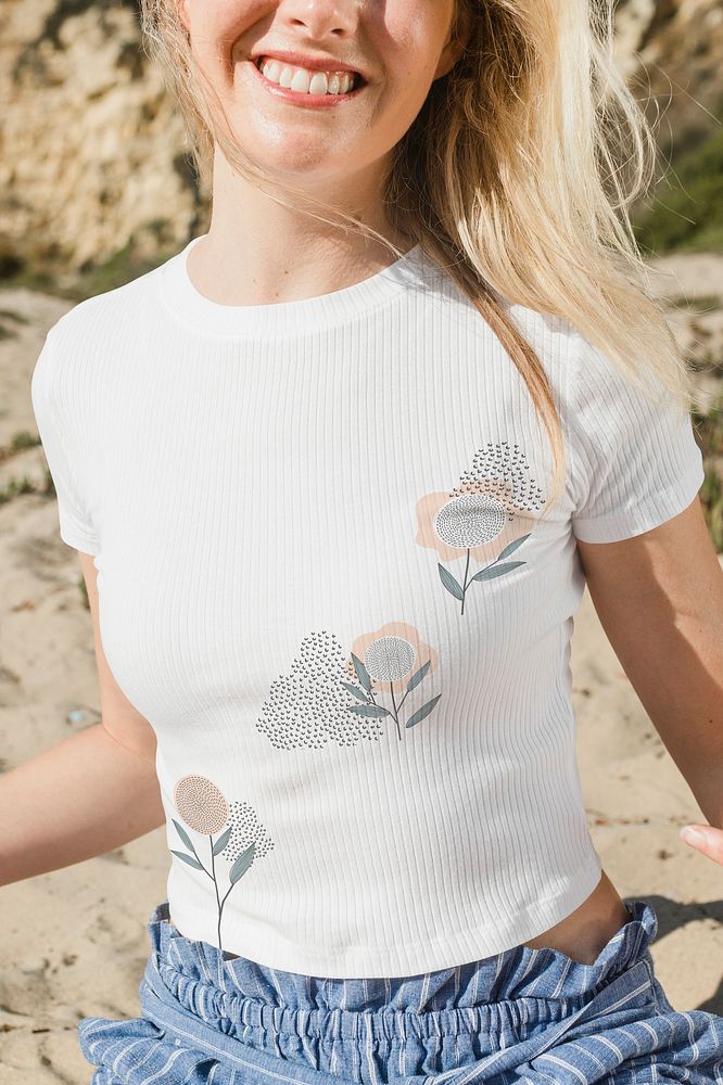 White t-shirt mockup psd with floral abstract print beach apparel shoot