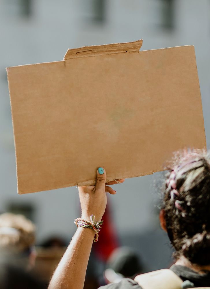 Woman holding a cardboard at a Black Lives Matter protest outside the Hall of Justice in Downtown Los Angeles. 15 JUL, 2020 …