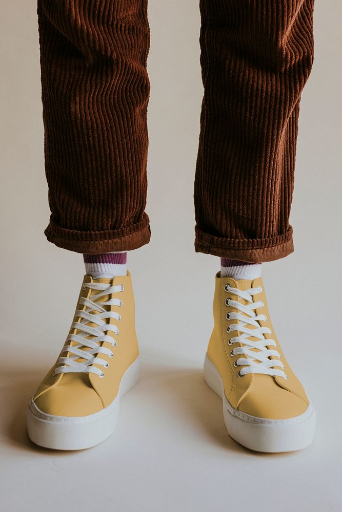 Yellow high top sneakers mockup on model