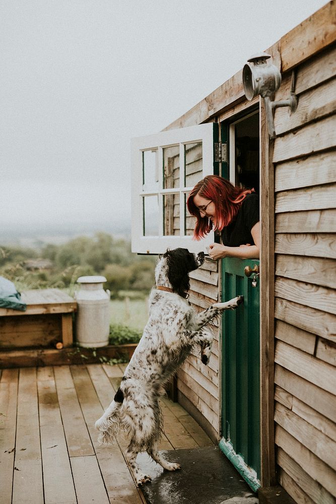 Woman playing with her dog