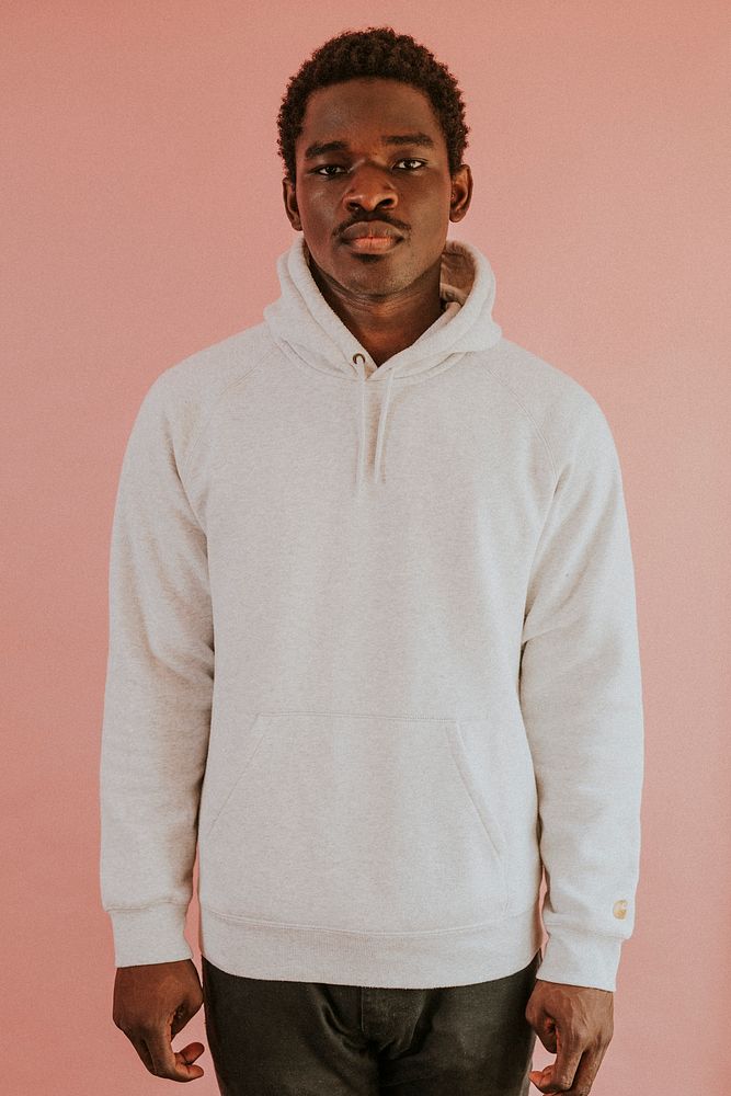 Black man in white hoodie mockup on pink background