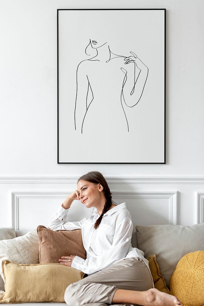 Picture frame with woman relaxing at home