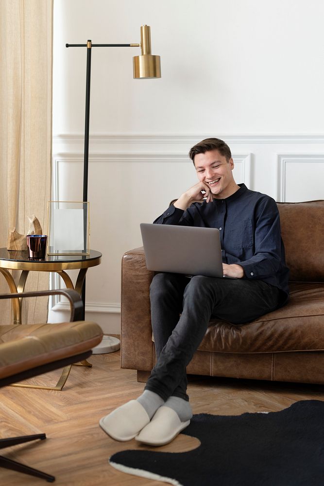 Man using a laptop and working from home