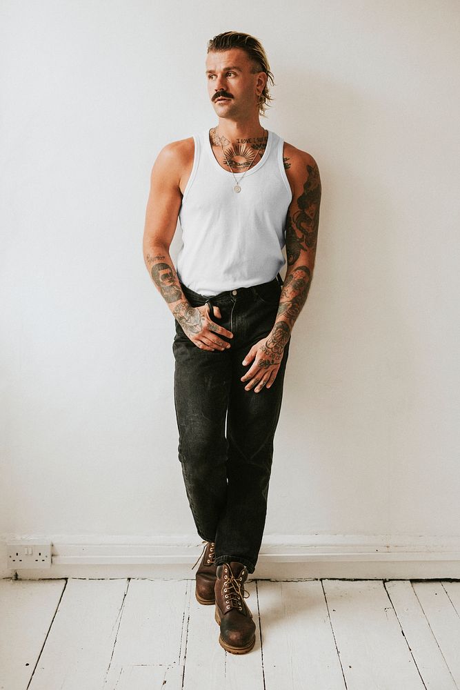 White tank top mockup psd with black jeans on a male model