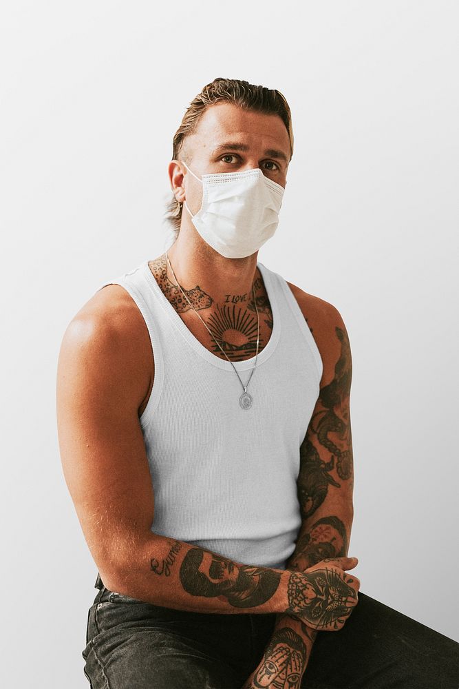 Men&rsquo;s tank top apparel mockup alternative fashion with a face mask in the new normal