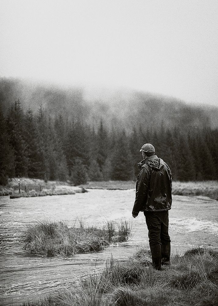 Lonely man standing in the nature alone