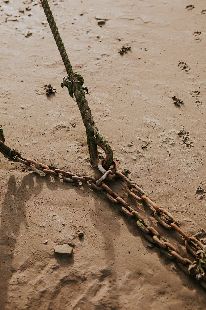 Rusty chain on the beach