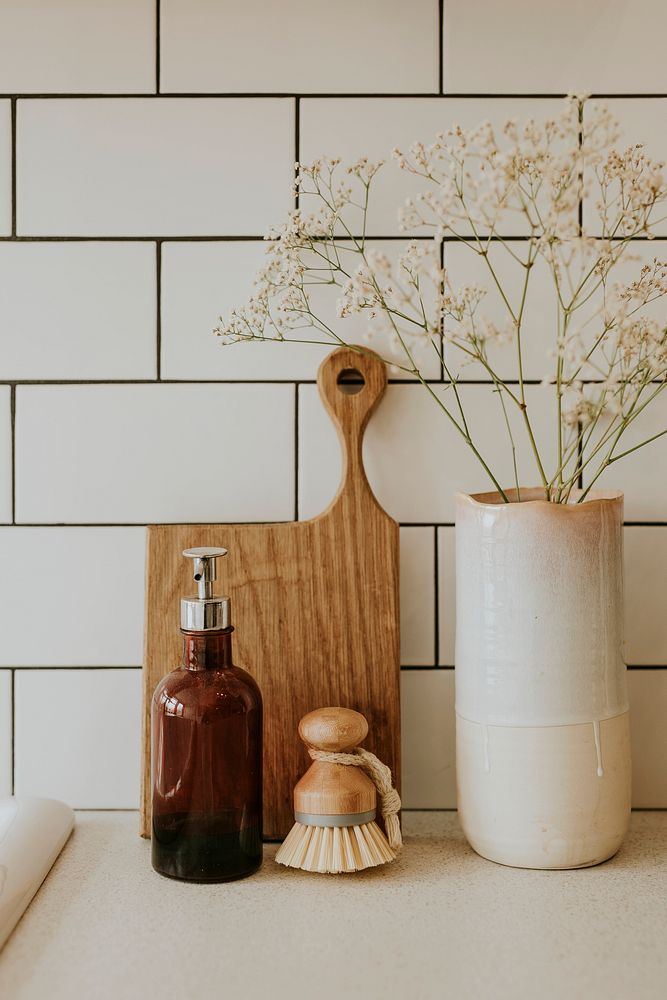 Cutting board and dishwashing soap in a cozy kitchen interior