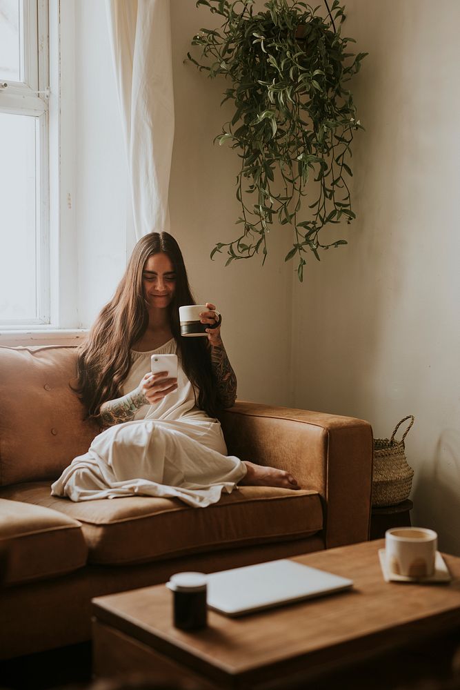 Woman sipping tea to relax afterwork while WFH
