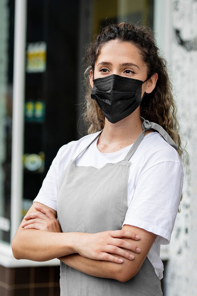 Shop owner with face mask, the new normal lifestyle